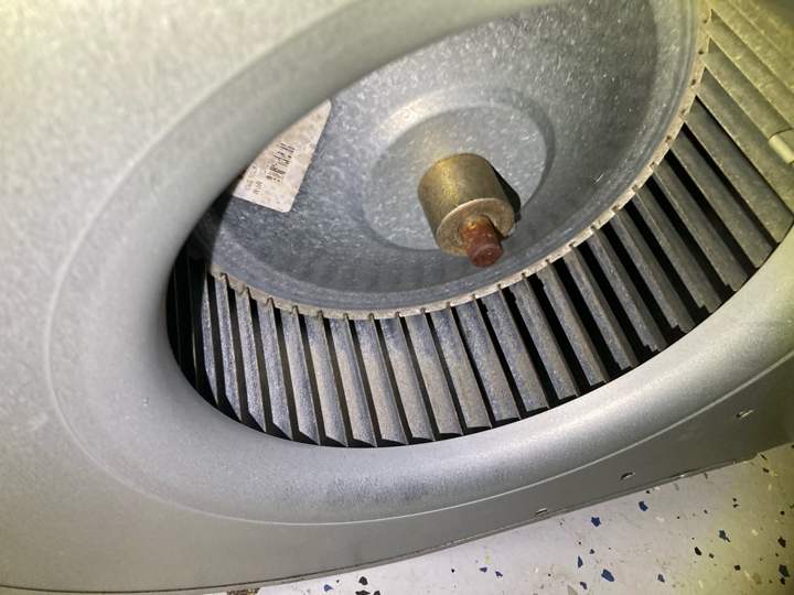 Dirty blower wheel inside an air handler