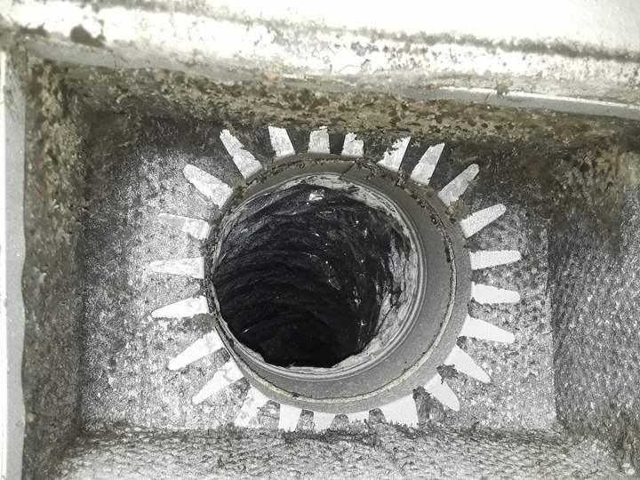 Supply boot and flex duct coated in dust